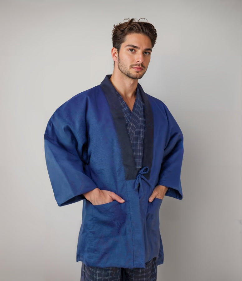 Man wearing blue hanten, a quilted kimono coat men style