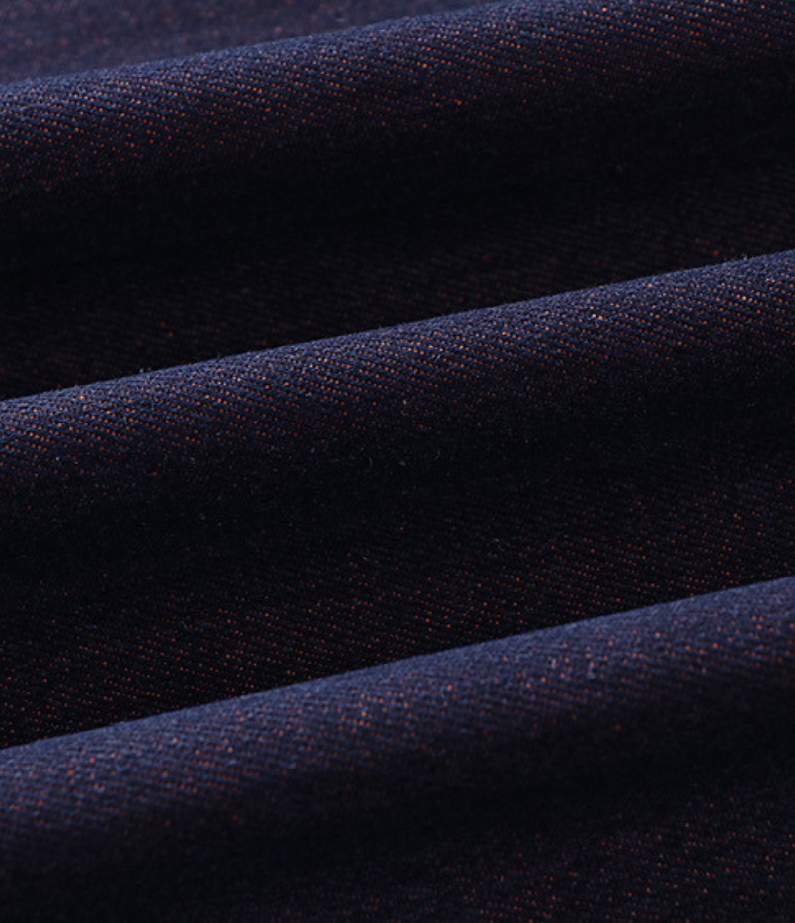 Close-up of indigo denim fabric of the reversible haori jacket