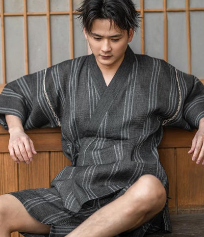 Lifestyle shot of men's jinbei pants and top, perfect for summer in Japan