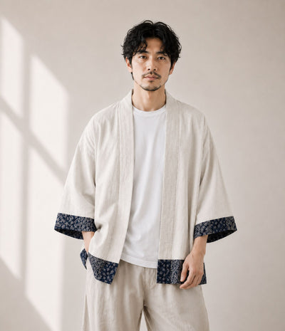 Man wearing a natural linen patchwork-trim haori jacket over a white tee