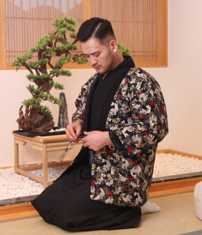 Man wearing navy hanten with koi fish, a traditional coat from Japan