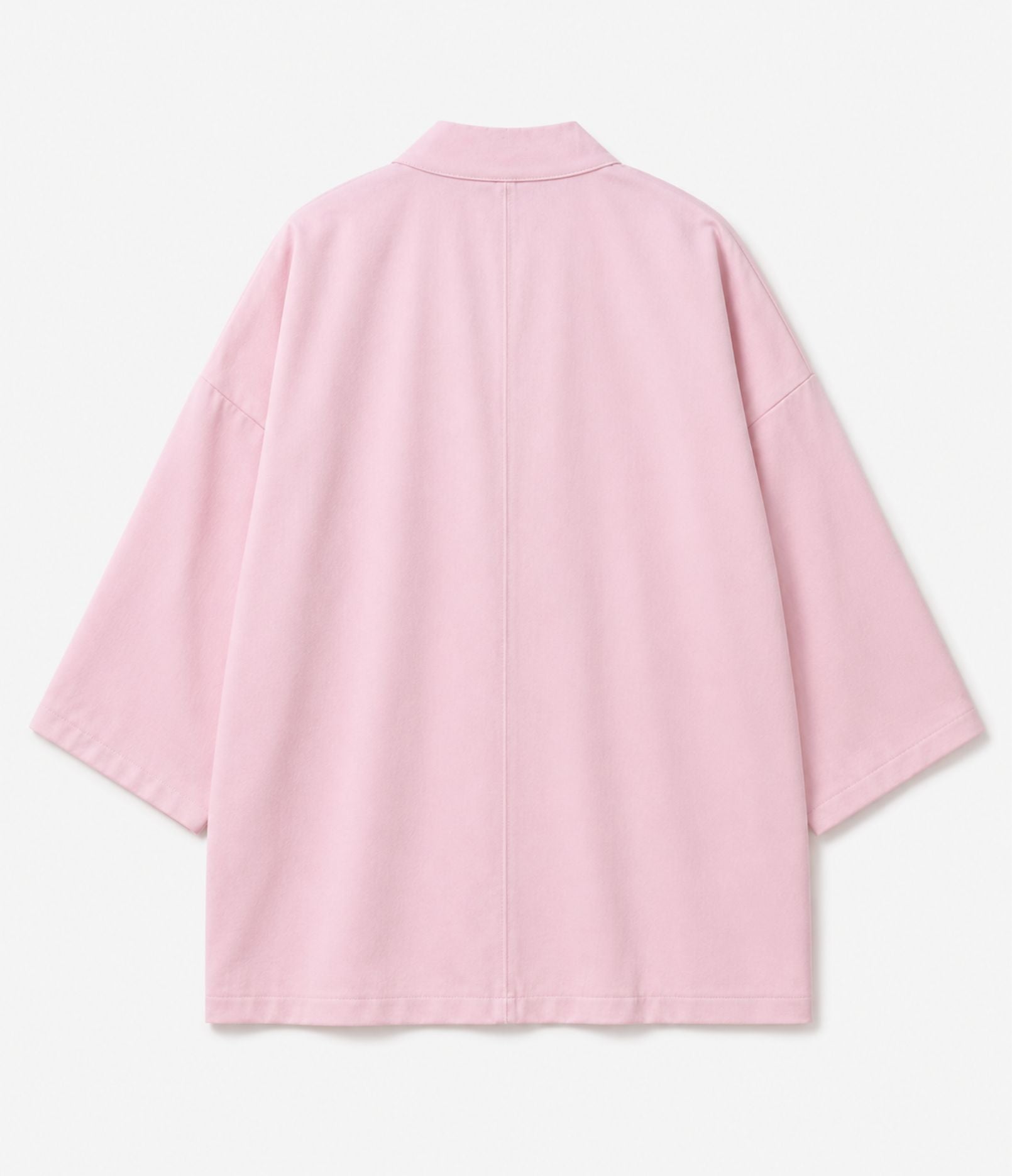 Back of a pink kimono jacket showing centre seam and wide sleeves